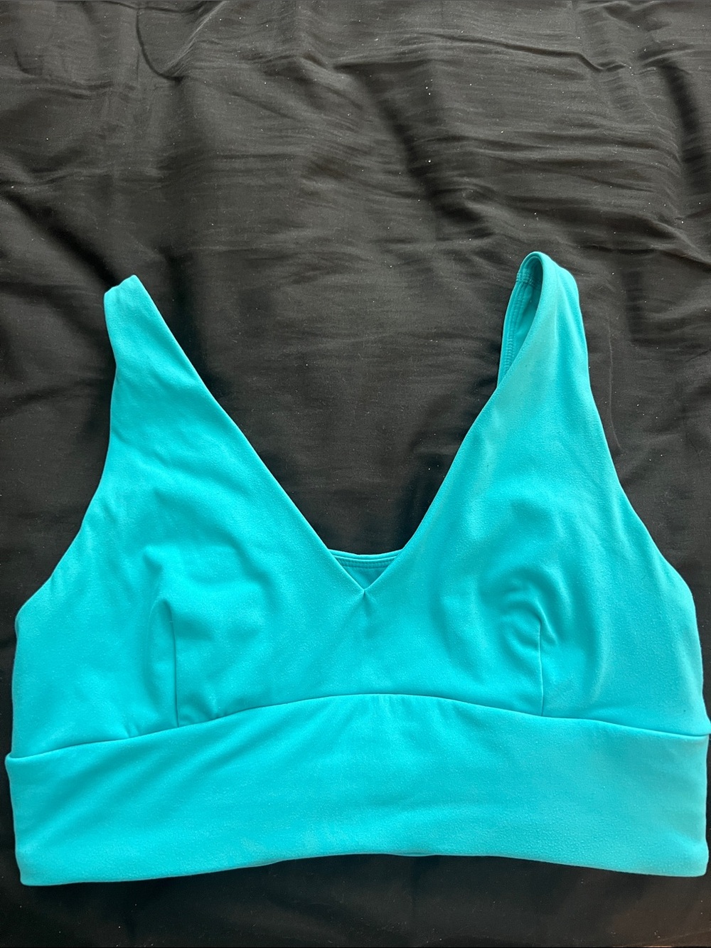 Alphalete Turquoise V‑Neck sports bra